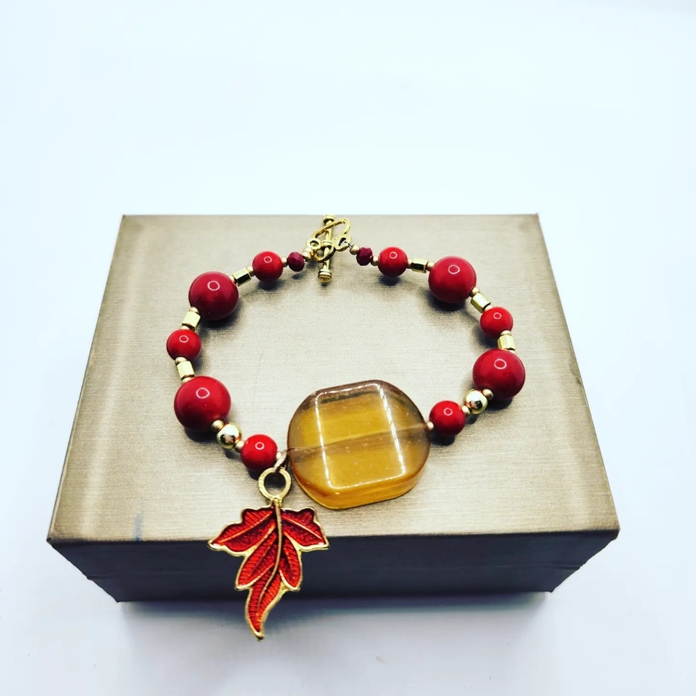 Coral (lab created), Yellow Quartz, leaf Enamel charm clasp bracelet
